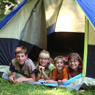 kids outside in tent